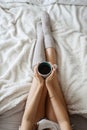 Female in bed drinking coffee. Happy girl. Morning concept. breakfirst in bed Royalty Free Stock Photo