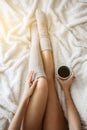 Female in bed drinking coffee. Happy girl. Morning concept. breakfirst in bed Royalty Free Stock Photo