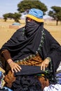 A female Berber vendor in a moroccan village at a traditional marketplace or souq Royalty Free Stock Photo