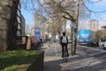 Female bicycle commuter in London, England, green energy, urban scene, transport