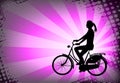 female bicyclist on the abstract purple background Royalty Free Stock Photo