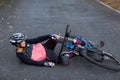 Female biker fallen from his mountain bike Royalty Free Stock Photo