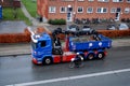 Female biker passing by truck in Kastrup Copenhagen