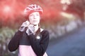 Female biker wearing bicycle helmet