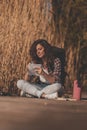 Female biologist writing in notebook during field work