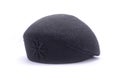 Female black felt beret isolated on white
