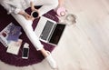 Female blogger with laptop and cup Royalty Free Stock Photo