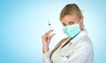 Female blonde doctor with vaccine syringe Royalty Free Stock Photo