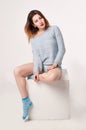 Female in blue blousen, pantie and socks Royalty Free Stock Photo