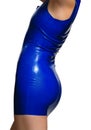 Female body in blue lustrous latex dress Royalty Free Stock Photo