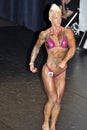 Female bodybuilding contestant showing her best