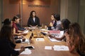 Female boss chairing a business meeting in a boardroom Royalty Free Stock Photo