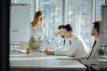 Female boss reproaching her employees for mistakes in work Royalty Free Stock Photo