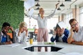 Female boss scatters documents, papers in the office, dissatisfied with work Royalty Free Stock Photo