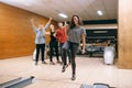 Female bowler throws ball on lane, strike shot Royalty Free Stock Photo