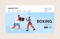 Female boxer practicing boxing exercises with male trainer healthy lifestyle boxing concept