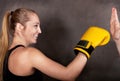 Female boxer practicing in the boxing ring Royalty Free Stock Photo