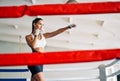 Female boxer practicing her punches at a boxing studio