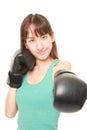 Female boxer throwing a left jab