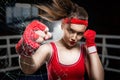 Female boxer training in gym, boxing workout