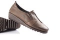 Female brown leather shoe Royalty Free Stock Photo