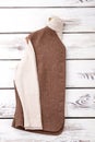 Female brown vest and white sweater. Royalty Free Stock Photo