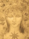 Female buddha with lotus flowers in sepia tones. Royalty Free Stock Photo