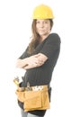 Female builder tool belt hard hat helm Royalty Free Stock Photo