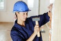 female builder using sledgehammer Royalty Free Stock Photo