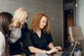 Female business partners have online meeting with potential investor with laptop Royalty Free Stock Photo