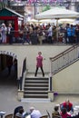 Female busker, singing opera at Covent Garden, London. Royalty Free Stock Photo