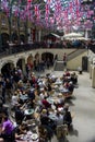 Female busker, singing opera at Covent Garden, London.