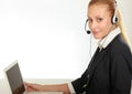 Female call center operator with headphone