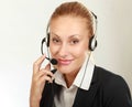 Female call center operator with headphone