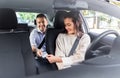 female car driver taking money from passenger Royalty Free Stock Photo