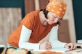 Female carpenter sketching project draft notes in woodwork workshop Royalty Free Stock Photo