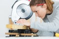Female carpenter using circular saw Royalty Free Stock Photo
