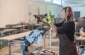 Female carpenter Using Circular Saw Royalty Free Stock Photo