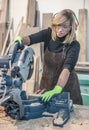 Female carpenter Using Circular Saw Royalty Free Stock Photo