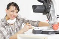 female carpenter using circular saw for wood Royalty Free Stock Photo