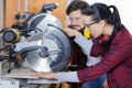 female carpenter working with circular saw Royalty Free Stock Photo