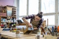 Female carpenter working in her workshop Royalty Free Stock Photo