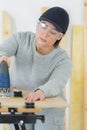 Female carpentry entrepreneur working hard