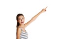 Female caucasian teen pointing up with a finger.