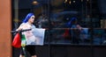 Female character with blue hair on the street in speed.