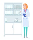 Female character with clipboard write notes. Redhead nurse in glasses is working in a hospital Royalty Free Stock Photo