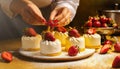 Female chef decorating cakes with fruits on the table