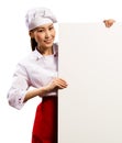 Female chef holding a poster for text