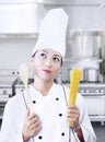 Chef holding sphagetti and wooden spoon Royalty Free Stock Photo