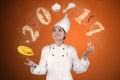 Female chef is juggling ingredients Royalty Free Stock Photo